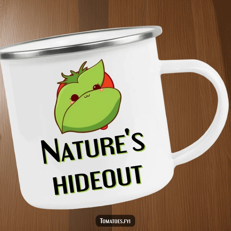 Funny camping mug shows a shy tomato peeking from behind a leaf, ideal for outdoor drinks with a touch of gentle humor.