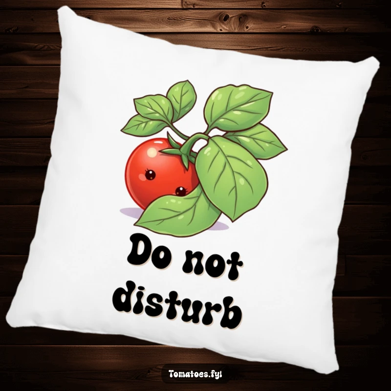 Funny shy tomato character peeking from behind a basil leaf, embroidered on a soft, plush pillow.