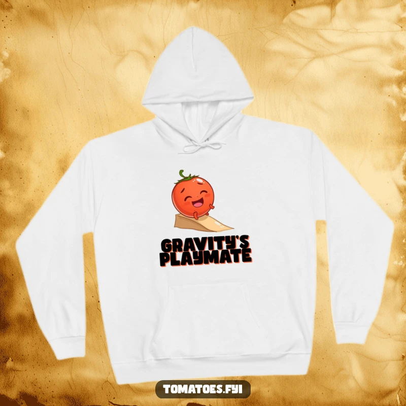 Funny hoodie featuring a giggling tomato character joyfully rolling down a small incline, radiating warmth and playful energy.