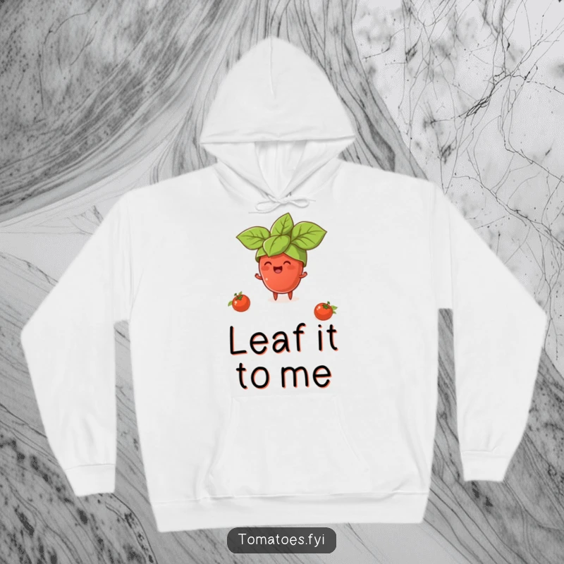 Funny hoodie depicting a tiny tomato character wearing a giant basil leaf hat, cozy and comedic food-themed apparel.